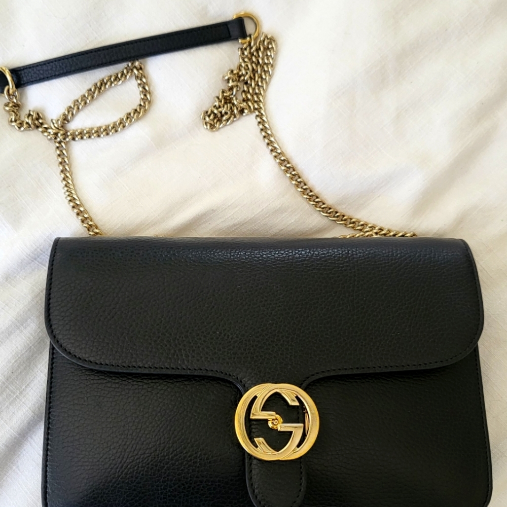 Gucci gold logo purse